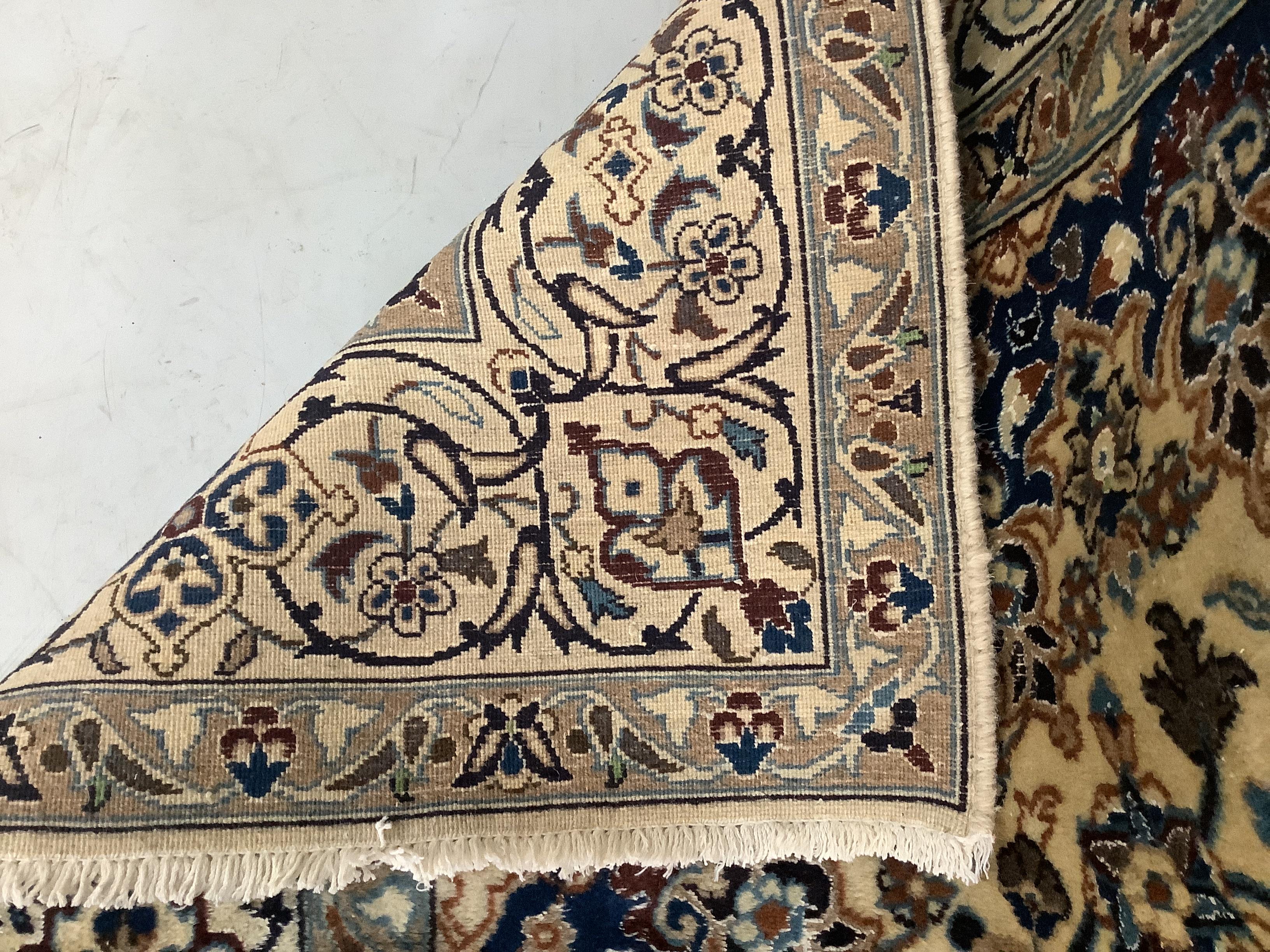 A fine Nain ivory ground carpet, 290 x 192cm